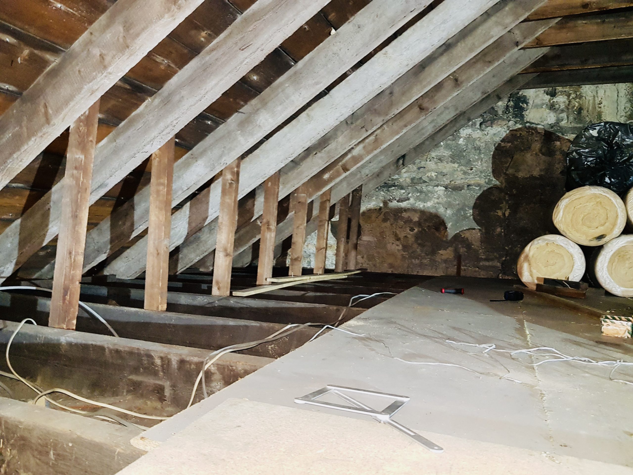 Empty disused loft space Empty loft showing exposed beams